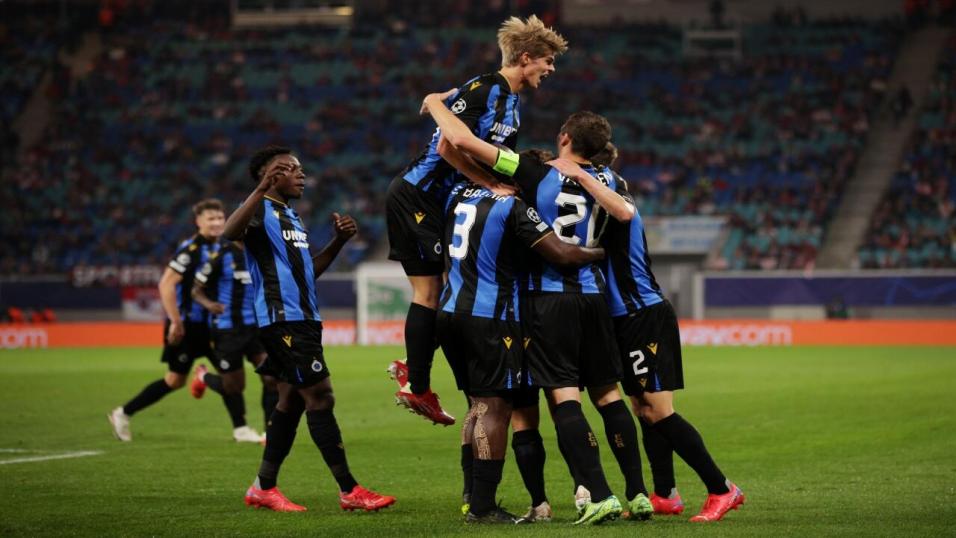 Club Brugge players celebrate a goal